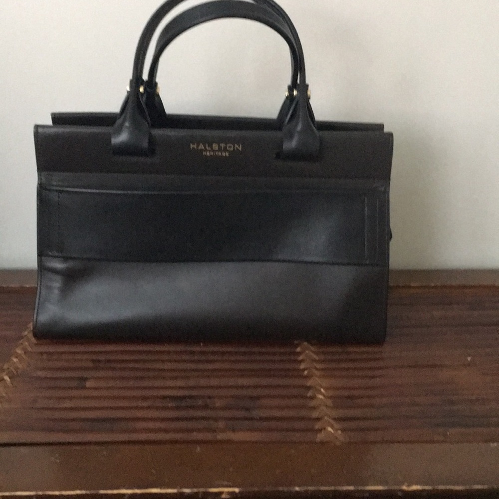 Dark brown with black handles Halston handbag